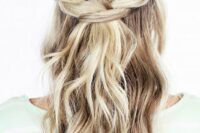 18 a simple boho or rustic wedding half updo with a braided halo, waves down is a cool idea for relaxed bridal styles