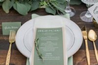 25 a greenery table runner, a green menu and a card, a matching placemat for a fresh feel at the table