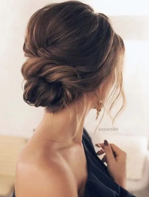 a low twisted bun and locks down is suitable for short and medium hair, and a bump on top is a cool addition