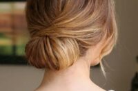 27 a low twisted chignon looks cute and elegant and is very easy to recreate, it will fit many formal bridal looks