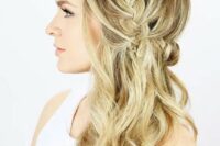 28 a side braided half updo with waves is a trendy idea with a twist to a usual braid