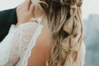 30 a gorgeous boho wedding half updo with a double braided halo, a bubble ponytail and waves down is amazing