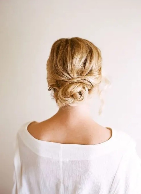 a simple twisted low bun is suitable for long and medium length hair, it's a classic idea to try