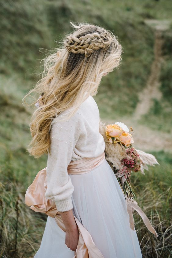 long hair down plus a double braided halo are a great combo for a boho bride, it looks chic and very effortless