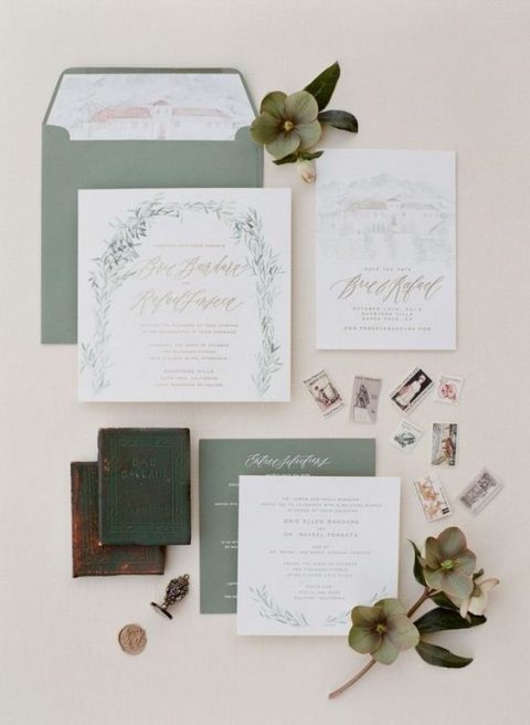 a sage green wedding invitation suite with botanical prints and some watercolors