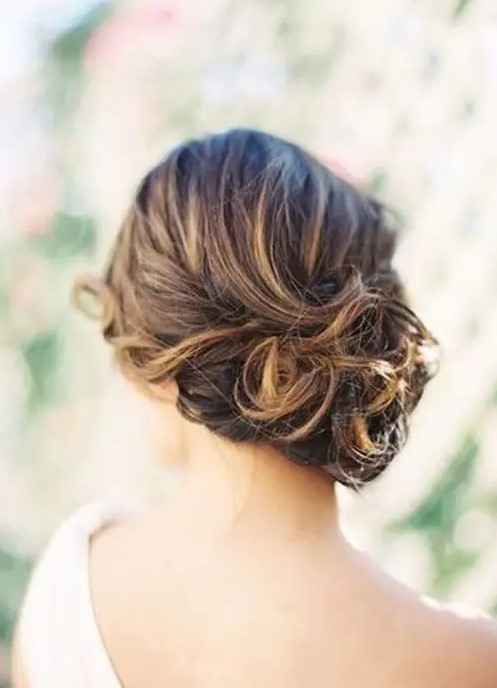 a gorgeous curly updo with a textural top is an elegant and stylish idea to go for