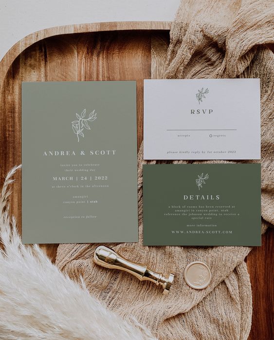 a stylish modern wedding invitation suite with a sage green, olive green and white cards