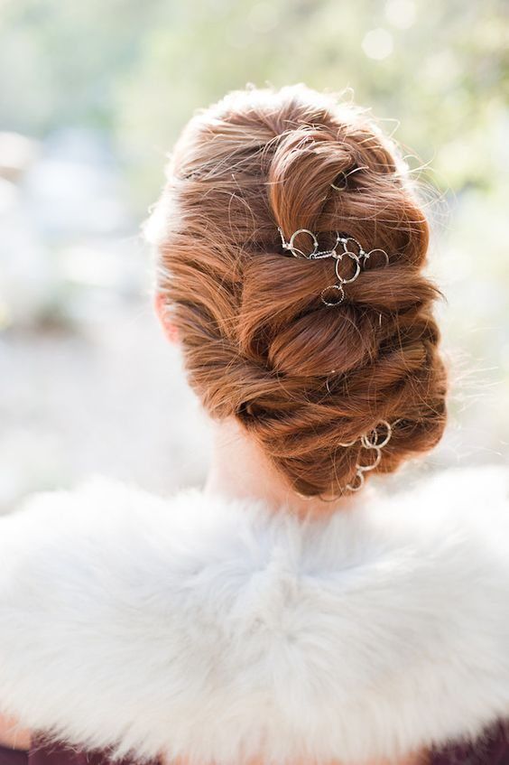 a beautiful and chic twisted low updo with a catchy hoop hair vine is a stylish and catchy idea for long hair, it feels like Vikings