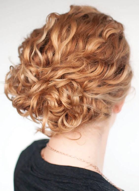 a beautiful and easy wavy updo with a wavy top and a beautiful ginger shade is a cool idea for a wedding