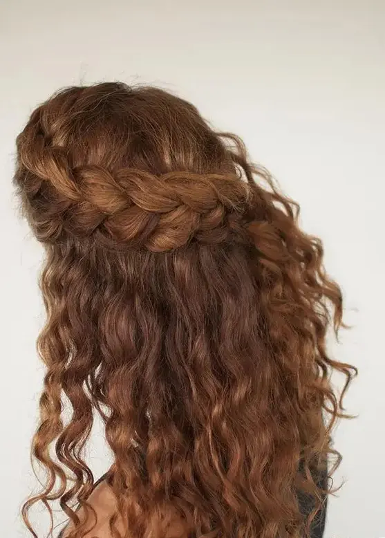 a half updo with a large side braided halo and locks down will easily accent your folksy or boho look