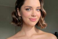 41 a lovely brown wavy bob with side parting is a very elegant and chic hairstyle to go for, it looks very beautiful and timeless