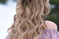 43 a lovely boho wedding hairstyle with a fishtail braid halo, a large knot and waves down is amazing