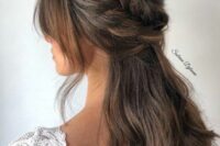 44 a lovely half updo with a large braided halo and a bump, waves down and some face-framing locks is amazing for a boho bride