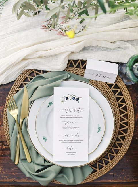 sage green napkins and echoing plates are chic for decorating your spring wedding table