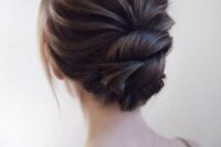 48 a chic wedding updo with a dimensional bump and twists will keep you picture-perfect during the whole day