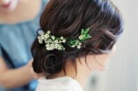 53 a wavy wedding updo with a volume on top and some locks down plus fresh blooms is ideal for medium hair