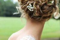 57 raise your curly hair into a comfy and chic updo and add some fresh blooms