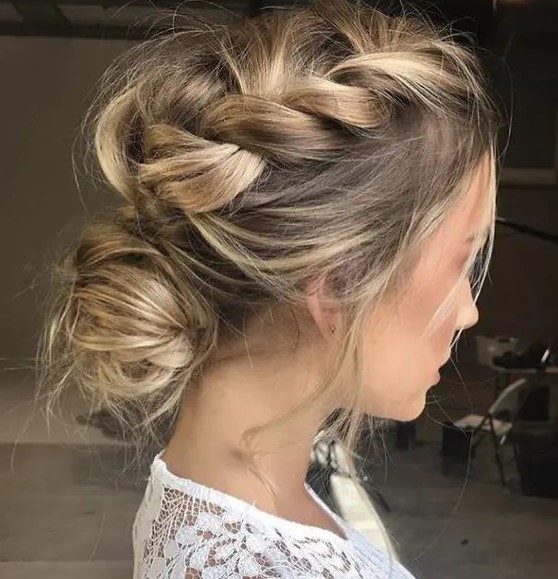 two sided braids on top plus a low bun with a bit of mess for medium or long hair