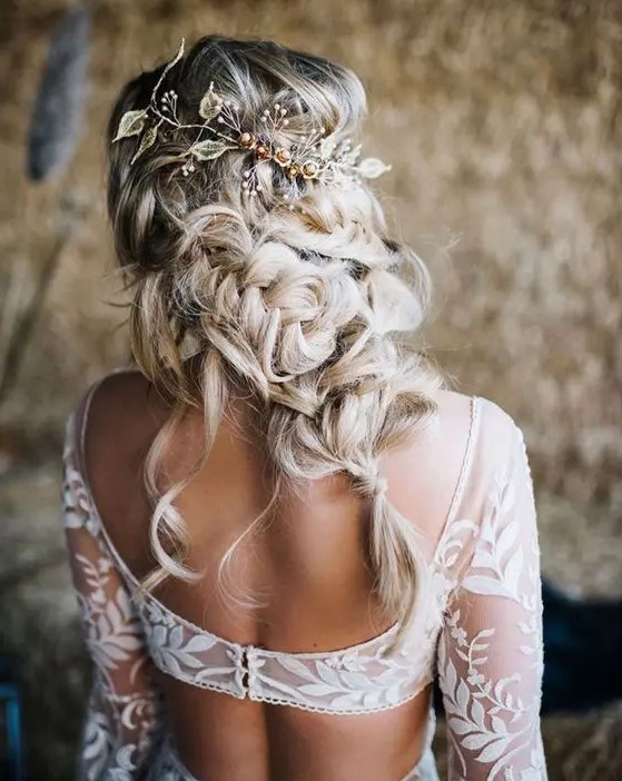 a catchy twisted and braided half updo with locks down and a beautiful embellished hair vine is amazing