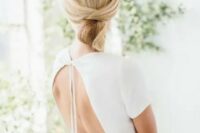63 a sleek minimalist twisted low updo with a sleek top is ideal for a minimalist bride