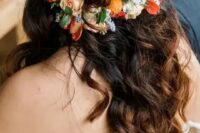 67 a half updo on long hair, with braids and waves down, with super bright blooms and greenery for a bold fall wedding