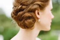 67 a twisted side updo with a textural top is a chic and elegant hairstyle idea to go for