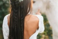 70 a half updo with braids hanging down adorned with a feather, berries and eucalyptus is great for a boho bride