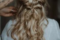 83 a wavy twisted half updo with a messy top, a pearl headband and waves down is a chic and romantic idea