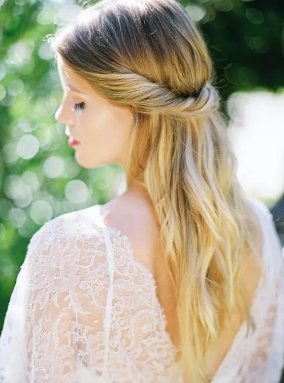 a casual twisted half updo is a timeless solution for any romantic bride, it fits any season and is great for boho or modern brides