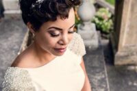 a dark brunette wavy pixie with a floral headband is a very chic and stylish idea for a wedding, it looks cool