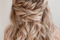 a gorgeous wavy and textured triple twisted wedding half updo is amazing for weddings, it’s perfect for long hair