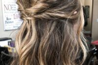 a long and wavy double twisted half updo with a bump on top and pretty balayage is a cool idea for a wedding, it looks chic and lovely