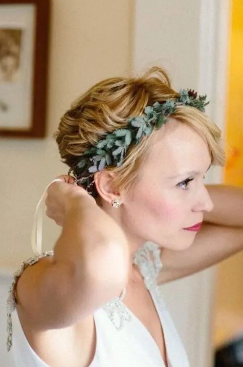a long blonde pixie styled with a green headband is a beautiful idea for an organic touch