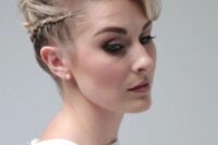 a long curly pixie with a side braid is a very creative and cool idea for a wedding, it looks very eye-catching