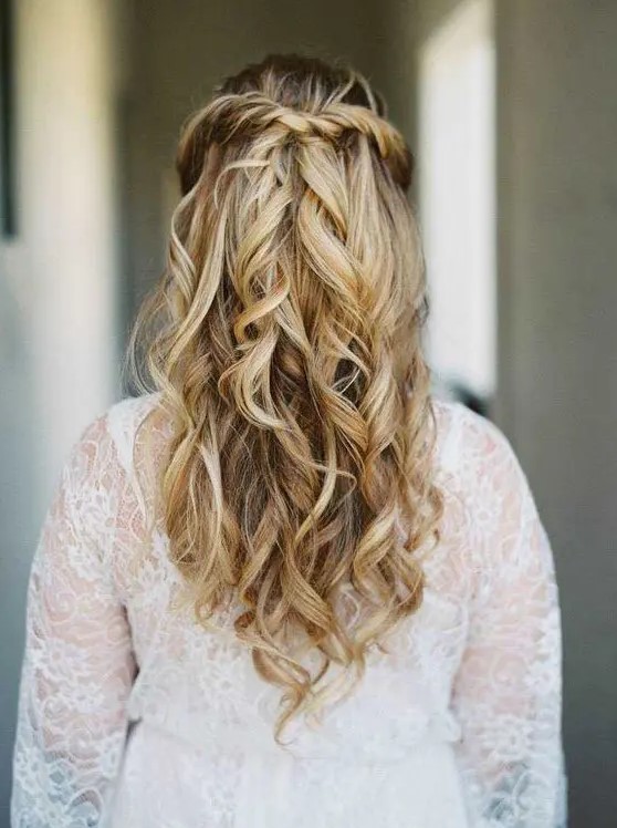 a twisted and wavy half updo is one of the hottest trends currently, and it will fit many informal bridal styles