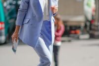 06 a periwinkle pantsuit,, a white shirt with a tie and white shoes are a lovely and stylish combo for a spring wedding