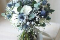 18 a chic and lovely wedding bouquet of white blooms, baby’s breath, blue thistles, greenery and baby’s breath is a lovely idea if you love neutrals