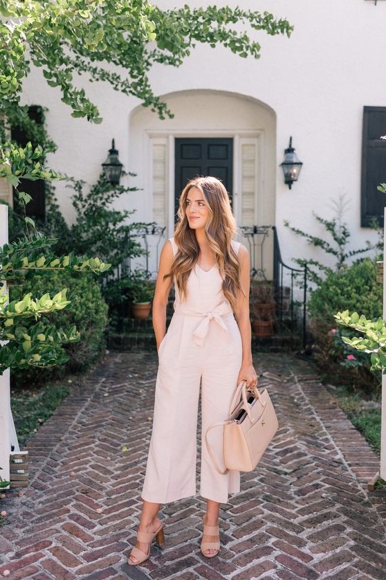 a neutral fitting jumpsuit with cropped wideleg pants, blush mules and a matching bag for a preppy casual look
