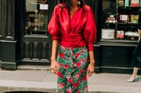 28 a deep red puff sleeve blouse, a green and red floral midi skirt, blue strappy heels for a fall wedding in bright shades