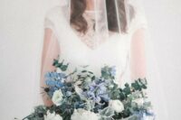 31 a fabulous wedding bouquet with white and blue blooms, eucalyptus, thistles and pale foliage is a lovely idea