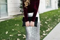37 a deep purple velvet top with long sleeves, a silver sequin maxi skirt and a black clutch for a breathtaking look