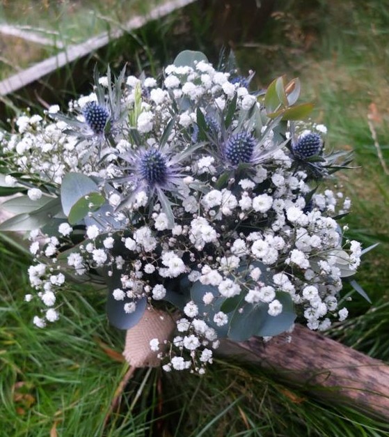 a lovely rustic wedding bouquet with baby's breath and thistles plus eucalyptus is a fantastic idea