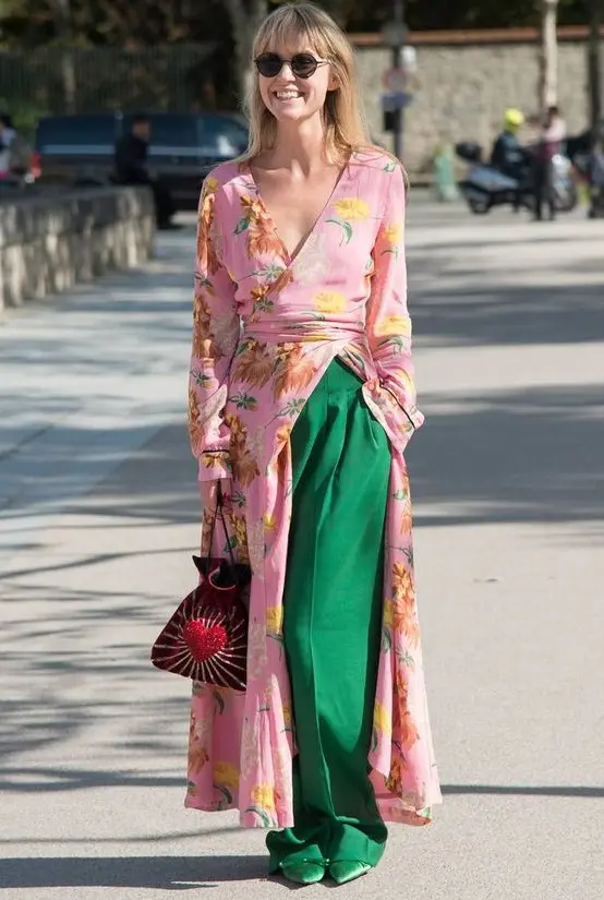 a pink floral kimono, apple grene wideleg pants, matching shoes and a bright emberoidered bag
