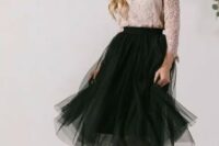 47 a black tulle skirt, a dusty pink lace top with sleeves, a statement necklace and nude heels