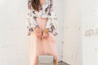 48 a blush ruffled asymmetrical midi, a floral blouse with bell sleeves, neutral shoes and a grey bag