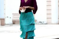 49 a catchy color block wedding guest outfit with a purple blouse, a turquoise fringe midi, a black belt and metallic shoes