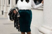 50 a chic look with an emerald velvet midi, a white top with a feather front and black shoes plus a bold printed coat