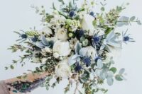 57 an ethereal wedding bouquet with white roses, thistles, berries and pale greenery is a fantastic idea for a spring or summer bride