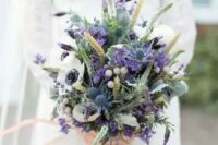 58 wheat, purple lavender, white anemones, blue thistles and various greenery for a colorful statement