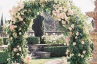 a lovely round wedding arch